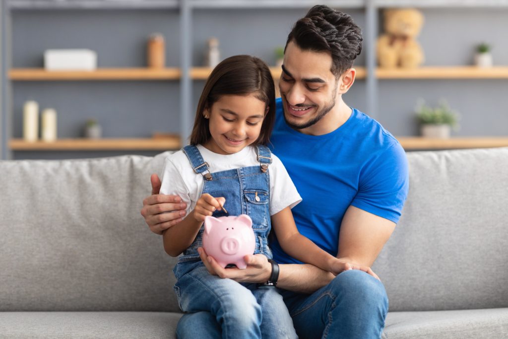 Father and daughter saving for college